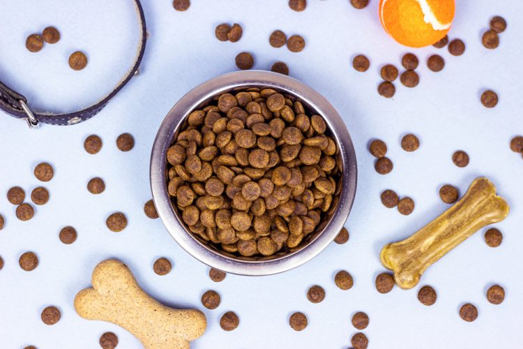 Top View Of Brown Biscuit Bones And Crunchy Organic Kibble